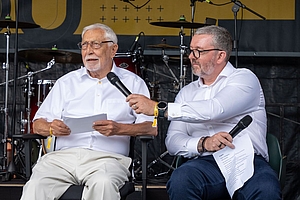 Photo of D. Christian Bender and Steve Mason (CRO) on stage during the Bender Summer Festival